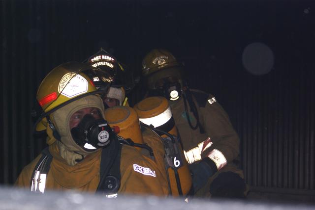 SLVFD member Craig Barry leads an attack line during live exercise at the Lake Placid training facility 9/18/2010